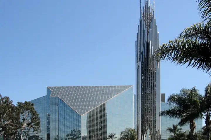 Glass cathedral and palm trees in Garden Grove, California, covered by Bodewell Appliance Repair